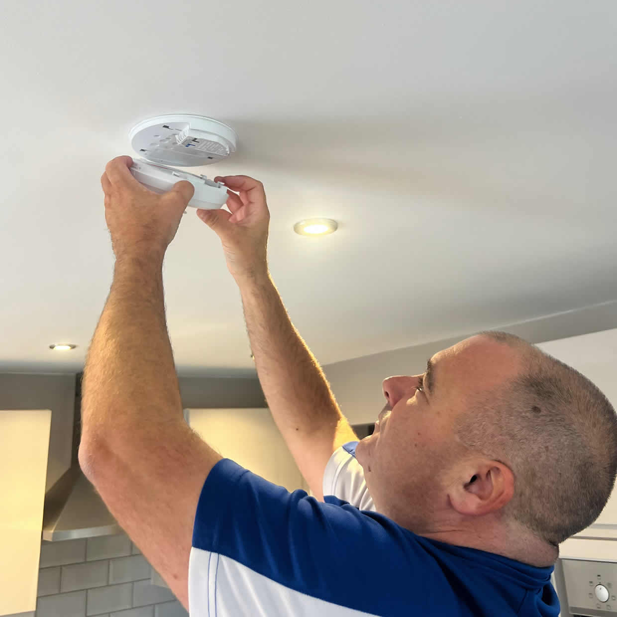 Different types of smoke and heat alarms installed in Huyton